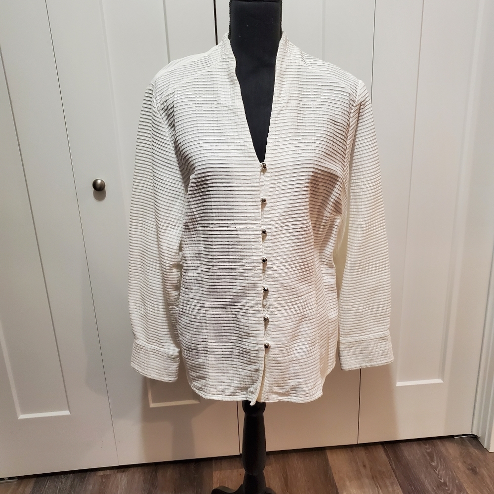 Dressy white pleated shirt.